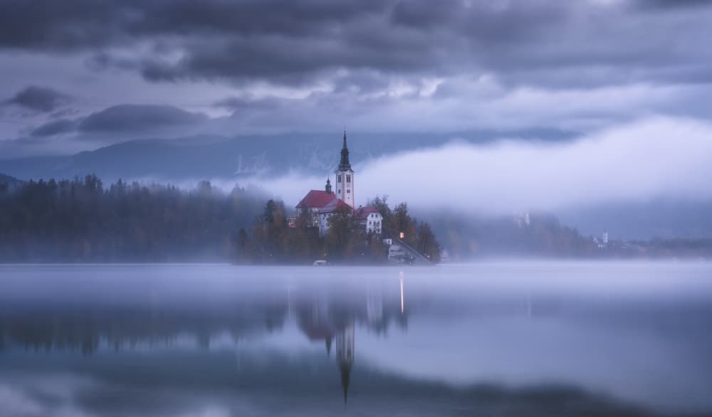 Misty Lake Bled Island by joanaduenas — canvas wall art
