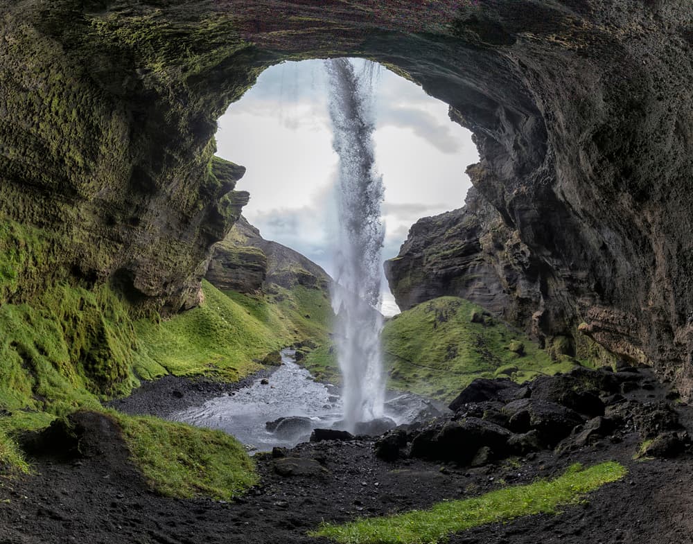 Inside The Waterfall Cave by Bragi Kort — canvas wall art
