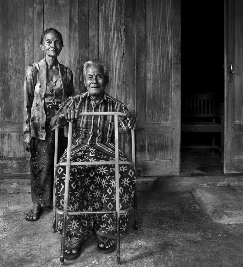 Smiling Elderly Couple by Sebastian Kisworo — canvas wall art