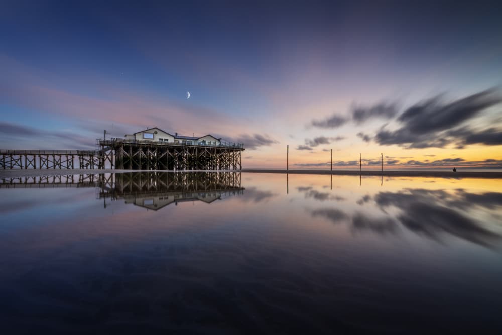 Pier Sunset Reflection by fotomarion — canvas wall art