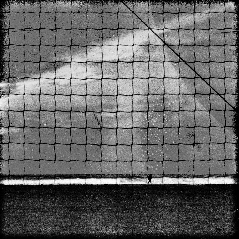 Gritty Net Solitary Figure by Paulo Abrantes — canvas wall art