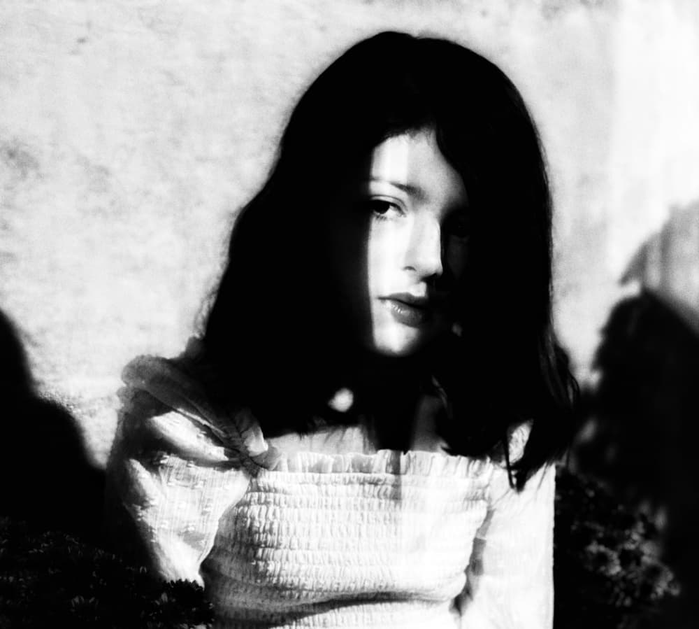 Girl in Dramatic Light by Delphine Margau — canvas wall art
