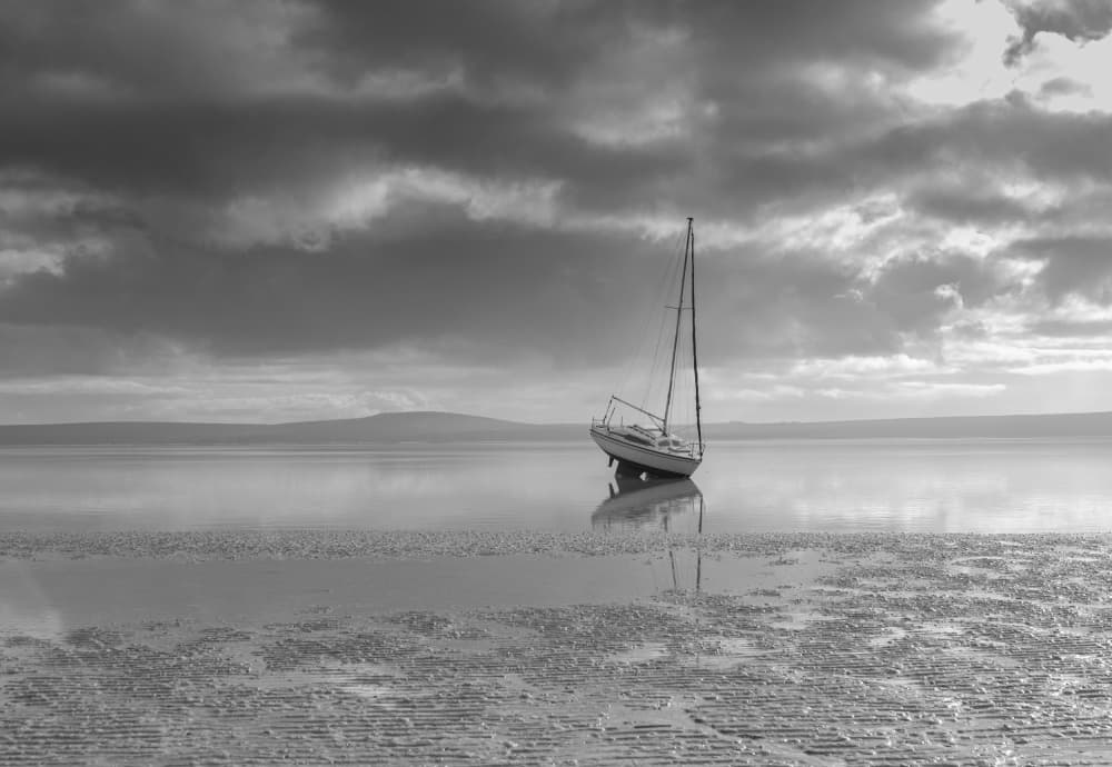 Lone Sailboat Reflections by Anthony Fox — canvas wall art