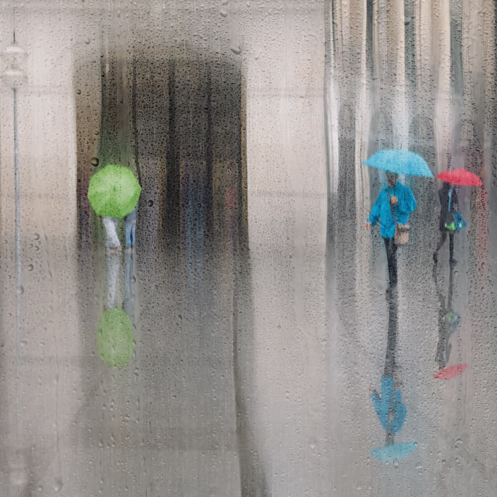 Rainy Street Umbrellas by Roswitha Schleicher-Schwarz — canvas wall art
