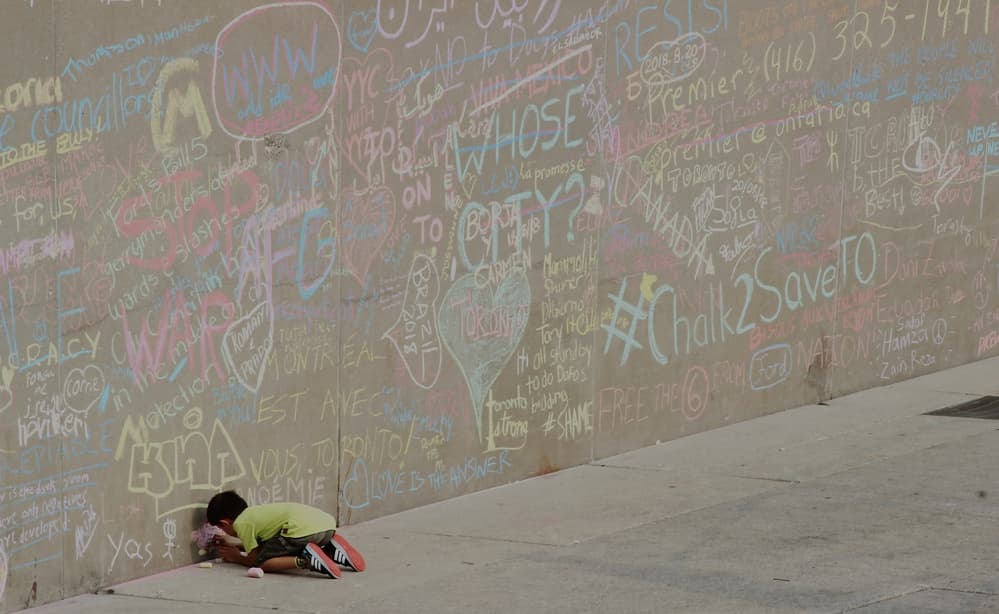 Child Drawing On Wall by Jian Wang — canvas wall art