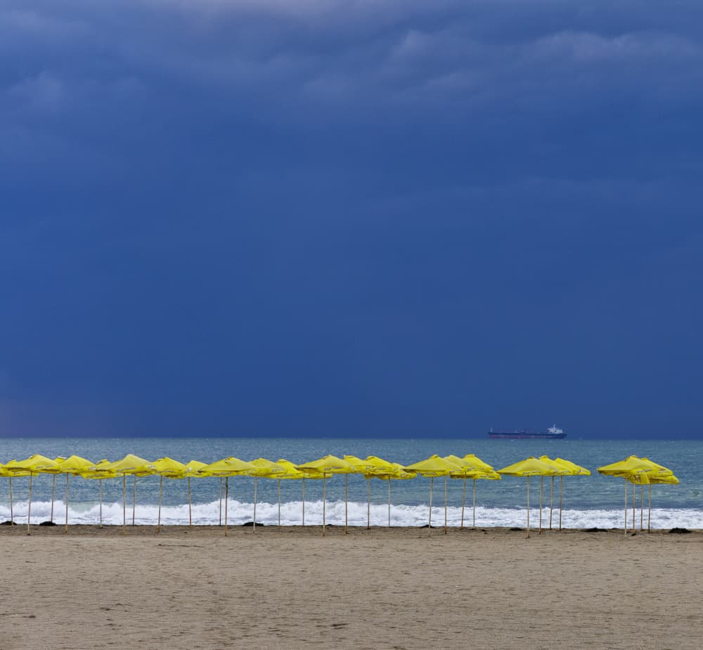Yellow Umbrellas Dark Sky by Zhecho Planinski — canvas wall art