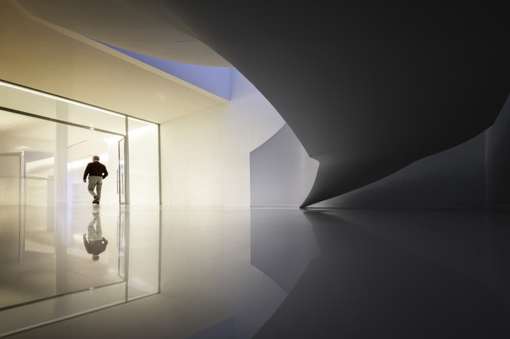 Figure in Reflective Architecture by fotomarion — canvas wall art