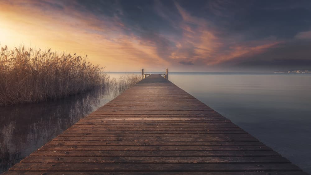 Peaceful Pier Sunset by Thomas de Franzoni — canvas wall art