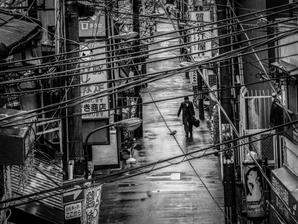 Man In Rainy Tokyo Alley by Haruyo Sakamoto — canvas wall art