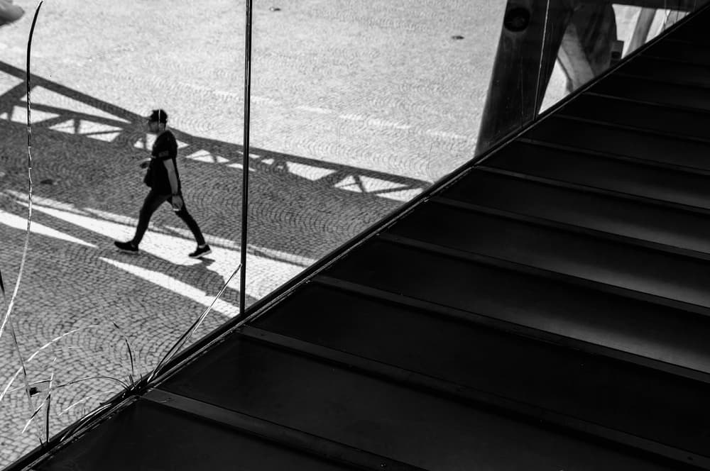 Man Walking in Strong Shadows by Fernando Alves — canvas wall art