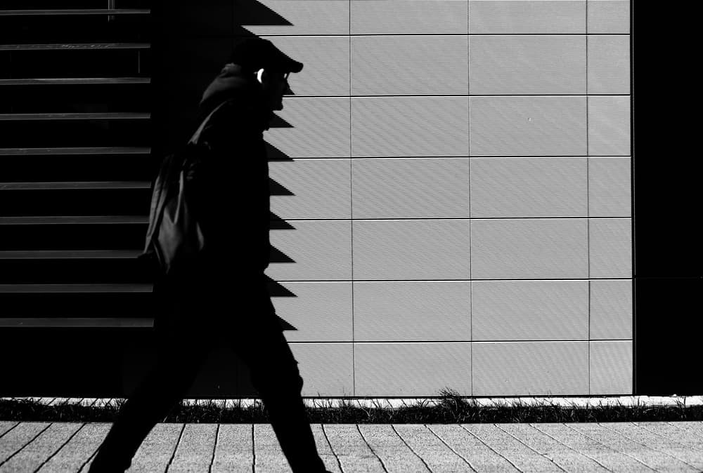 Urban Silhouette Walker by Anna Niemiec — canvas wall art