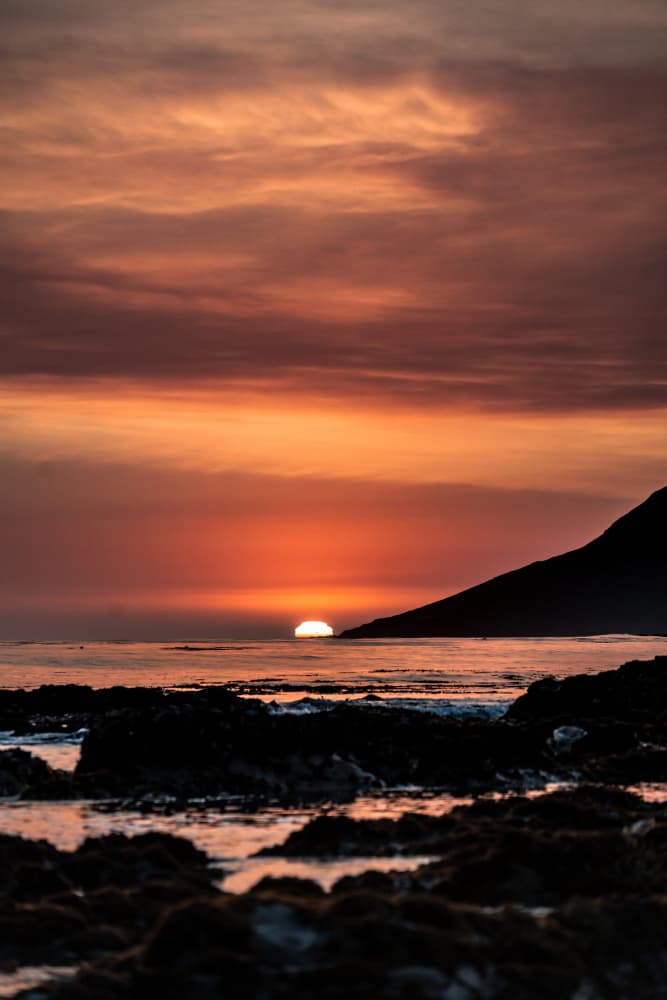 Fiery Ocean Sunset by Tim Mossholder — canvas wall art