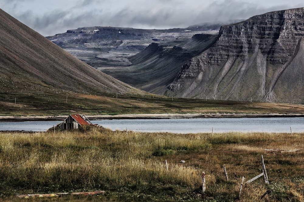 Rustic Cabin Fjord Landscape by Bragi Ingibergsson - BRIN — canvas wall art