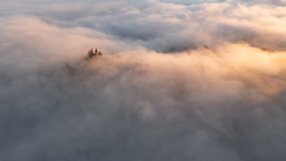 Church Above Clouds by Milan Malovrh — canvas wall art