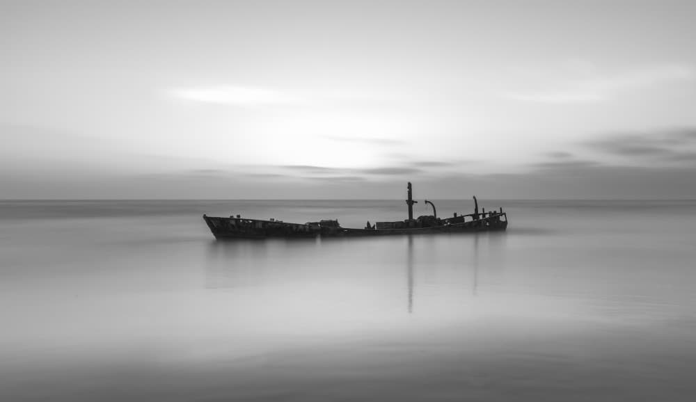 Wrecked Ship Stillness by Alon Lubrani — canvas wall art