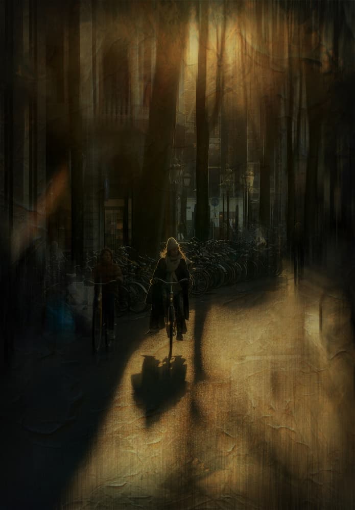 Golden Light Cyclist by Michel Romaggi — canvas wall art