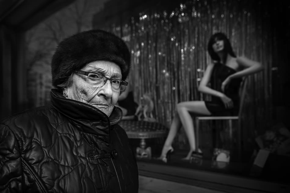Elderly Woman Shop Window by Christophe Debon — canvas wall art