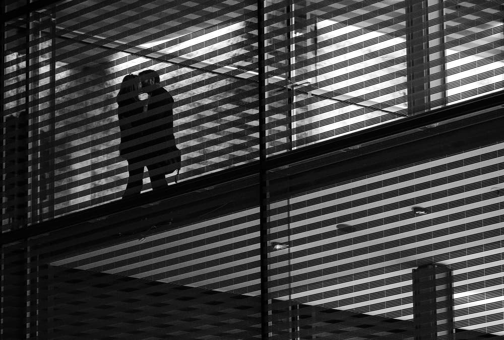 Kissing Couple Window Shadows by Jürgen Hartlieb — canvas wall art