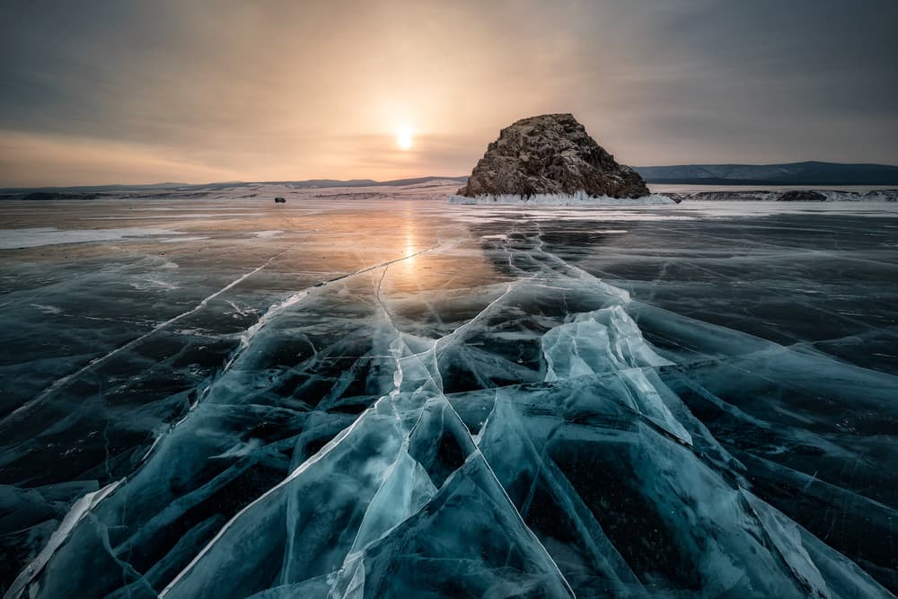 Sunset Over Frozen Lake by Juan Garcia Garcia Lucas (Pixelecta) — canvas wall art