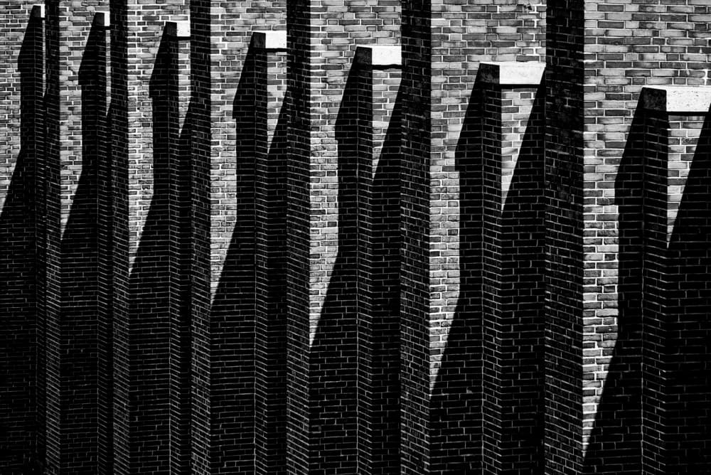 Geometric Brick Shadows by Rolf Endermann — canvas wall art