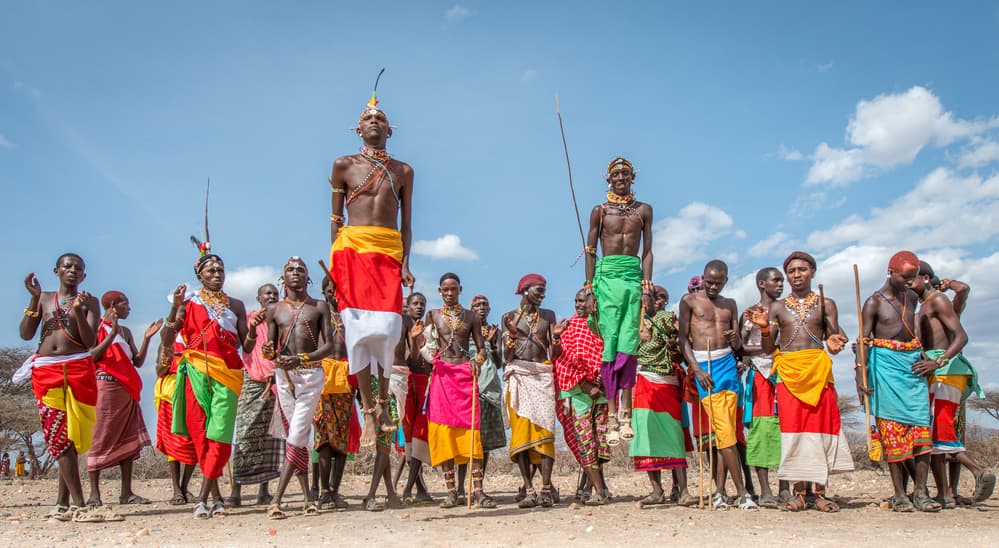 African Stilt Dancers by Jeffrey C. Sink — canvas wall art