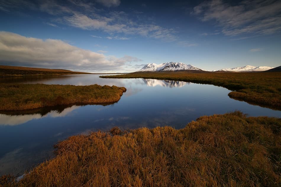 Snowy Mountain Lake Reflection by Raymond Hoffmann — canvas wall art