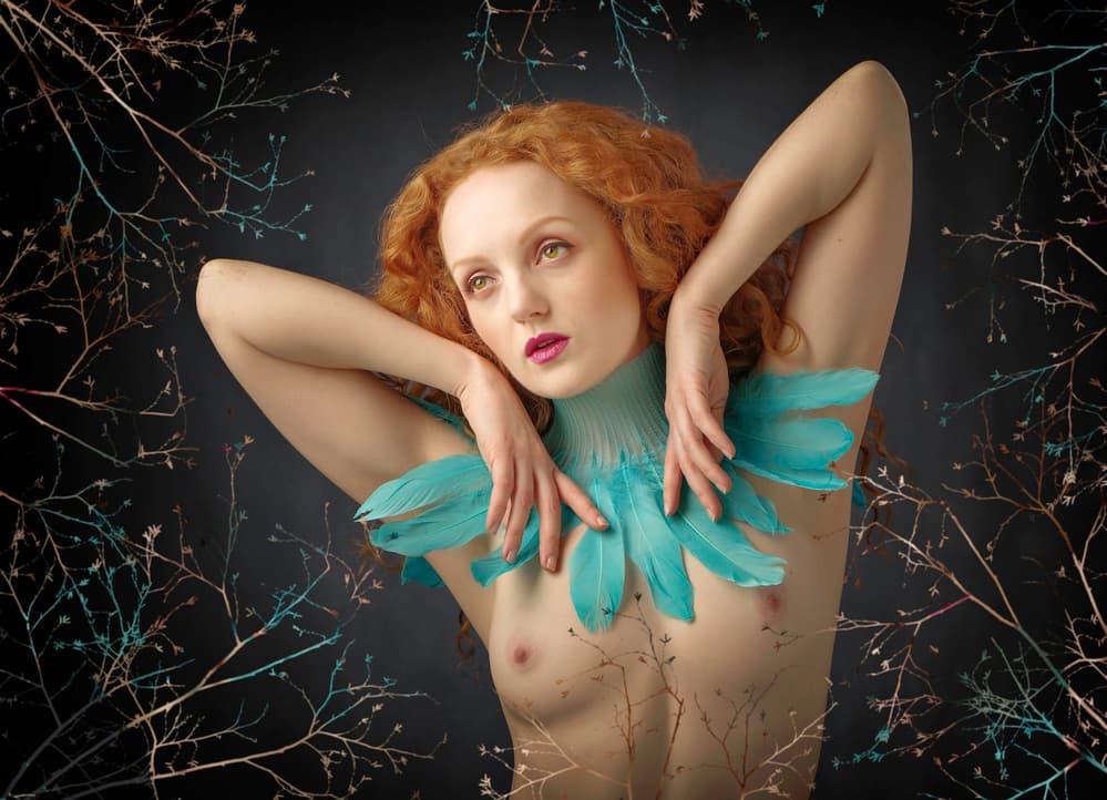 Woman Adorned Feathers by Catchlight Studio — canvas wall art