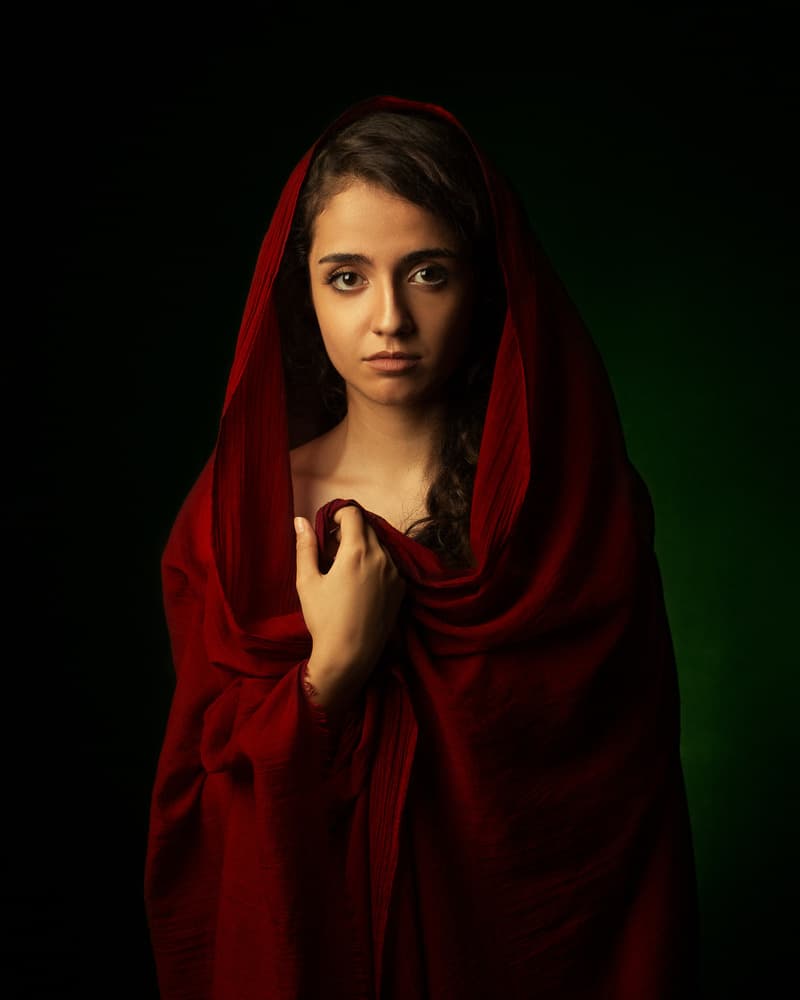 Pensive Woman in Red by Mehdi Mokhtari — canvas wall art