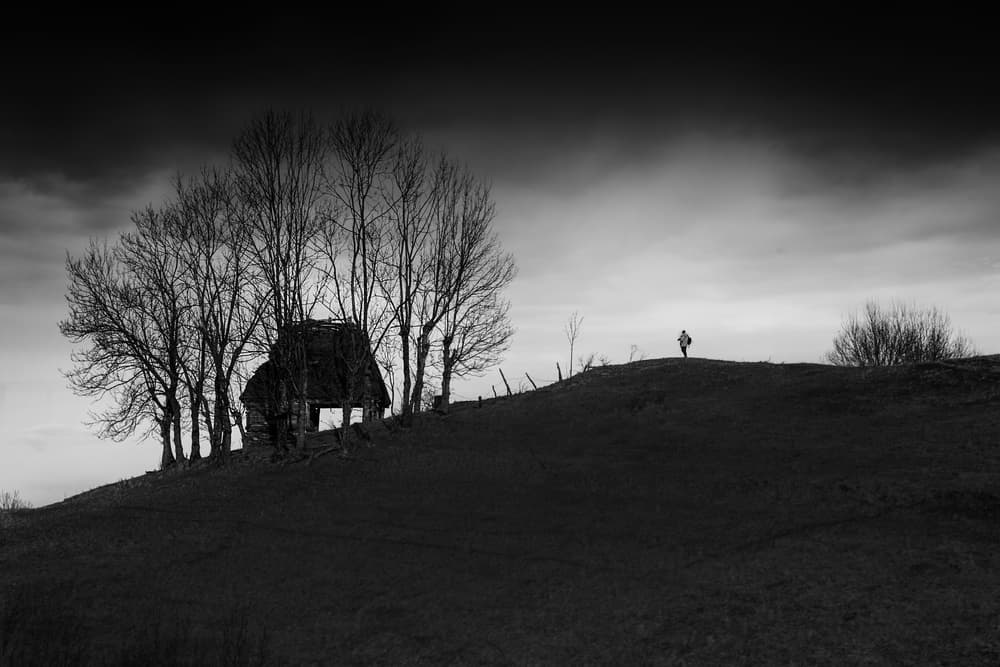 Dramatic Hillside Cabin by Catalin Alexandru — canvas wall art