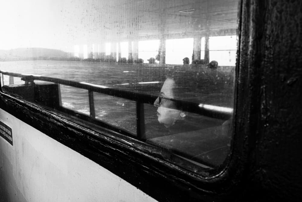 Ferry Window Reflection by Ali Ayer — canvas wall art
