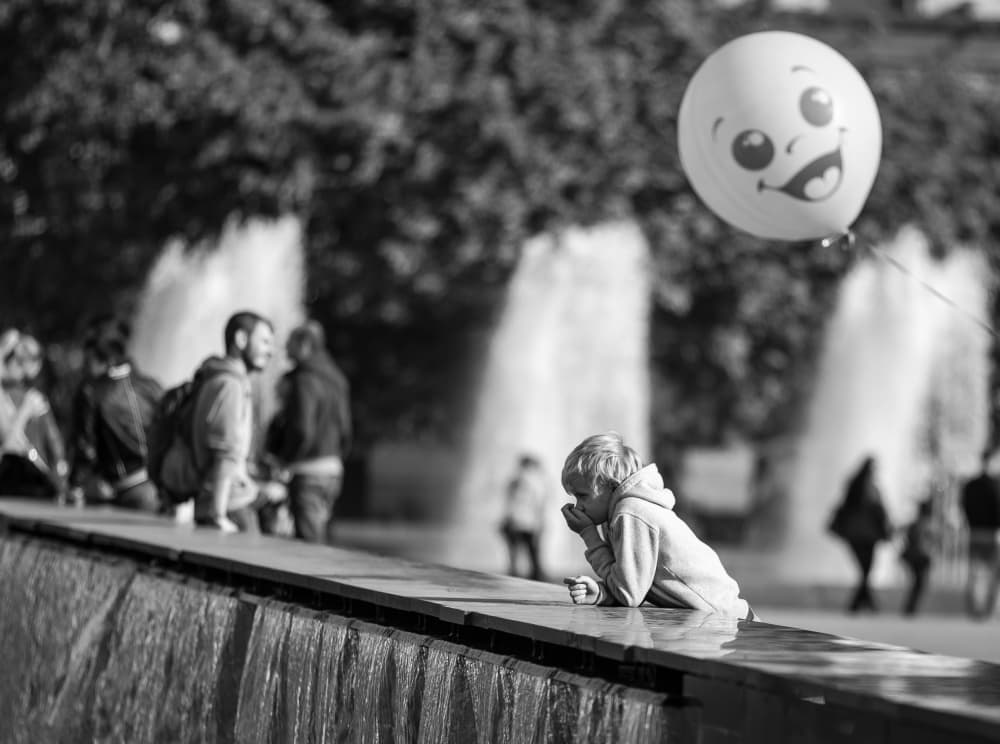 Boy and Happy Balloon by Olga Bekker — canvas wall art