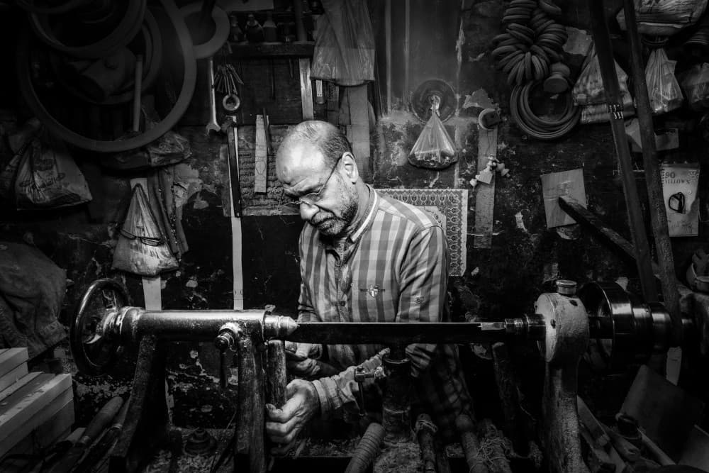 Artisan At His Lathe by Alaa Nour — canvas wall art