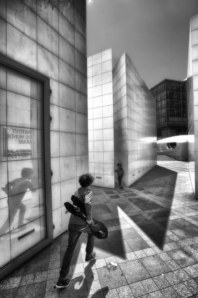Skateboarder in Urban Shadows by Eric Drigny — canvas wall art
