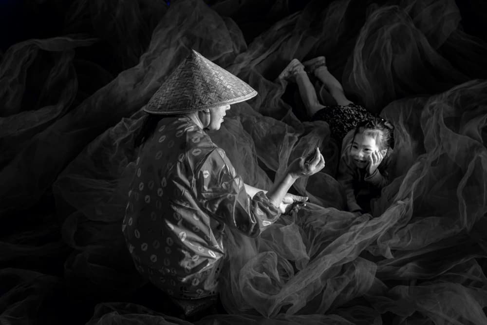 Gentle Storytelling Moment by Susan Moss — canvas wall art