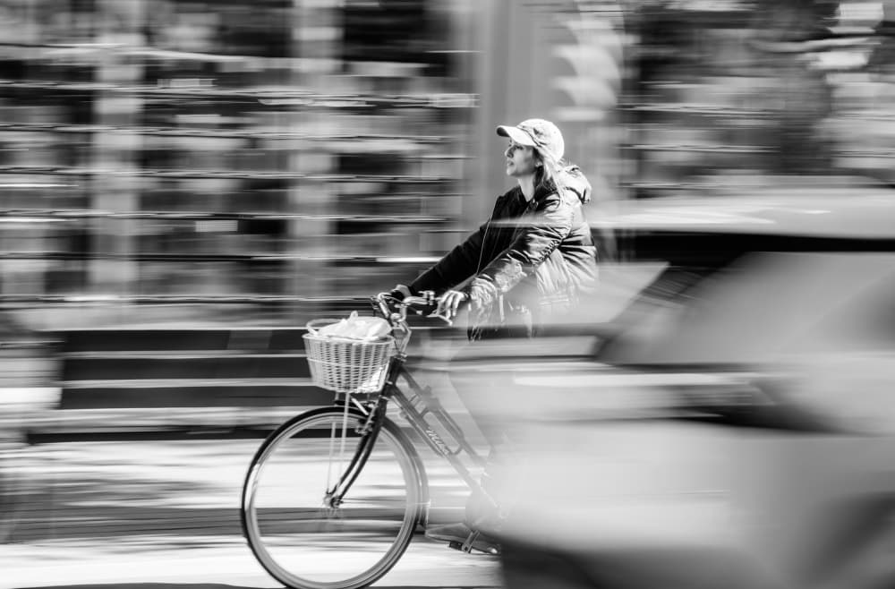Urban Cyclist In Motion by Itzik Einhorn — canvas wall art