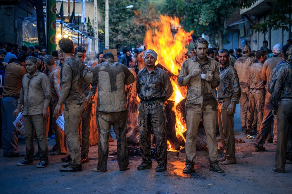 Mud Men Fire Ritual by Babak Mehrafshar — canvas wall art