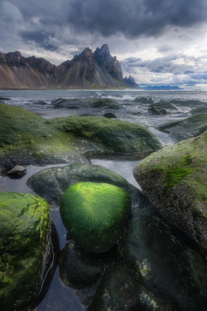 Green Rocks Mountain Seascape by Yun Thwaits — canvas wall art