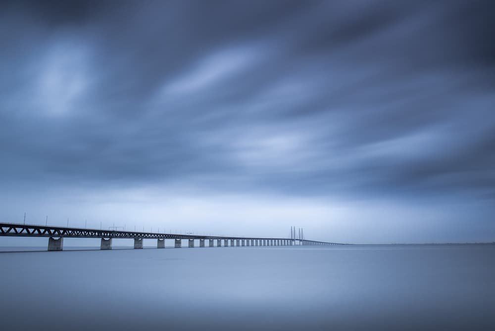 Dramatic Bridge Over Water by Andreas Christensen — canvas wall art