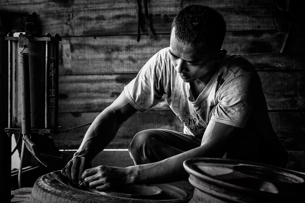 Intense Tire Repair by Rooswandy Juniawan — canvas wall art