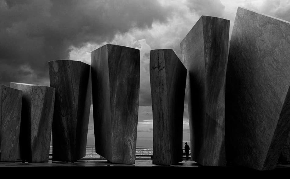 Monoliths Under Dramatic Sky by Luciano Caturegli — canvas wall art