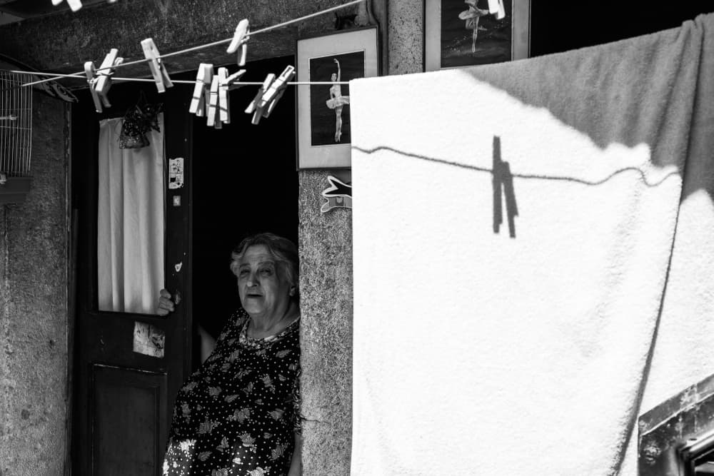 Elderly Woman Home Doorway by António Zarco — canvas wall art