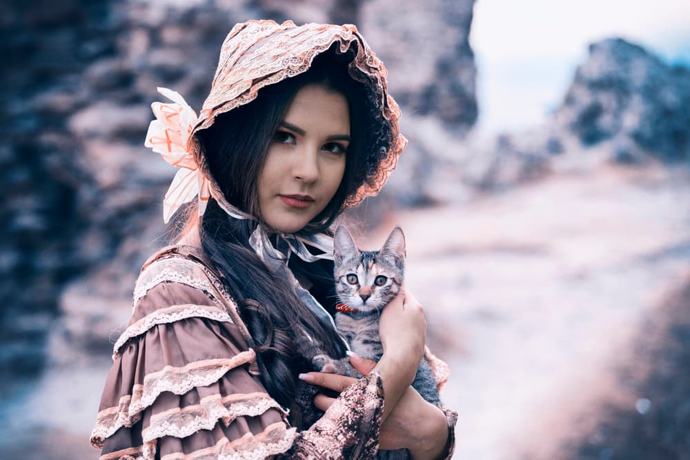 Gentle Woman Holding Kitten by Mihai Bogdan R — canvas wall art