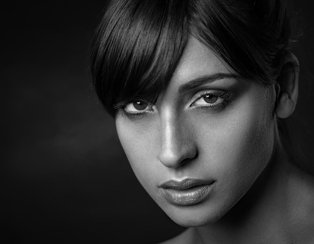 Intense Female Portrait by Luc Stalmans — canvas wall art