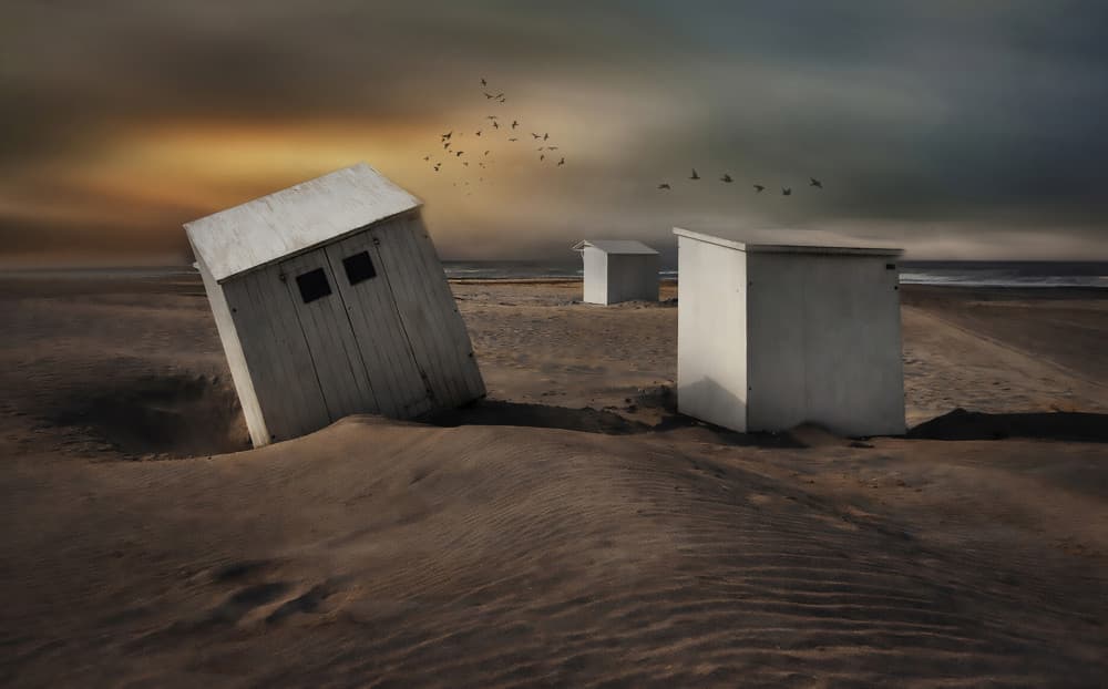 Leaning Beach Huts by Yvette Depaepe — canvas wall art