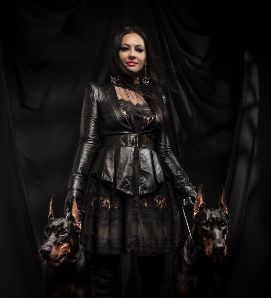Elegant Woman Dobermans by Robert Girmencea — canvas wall art