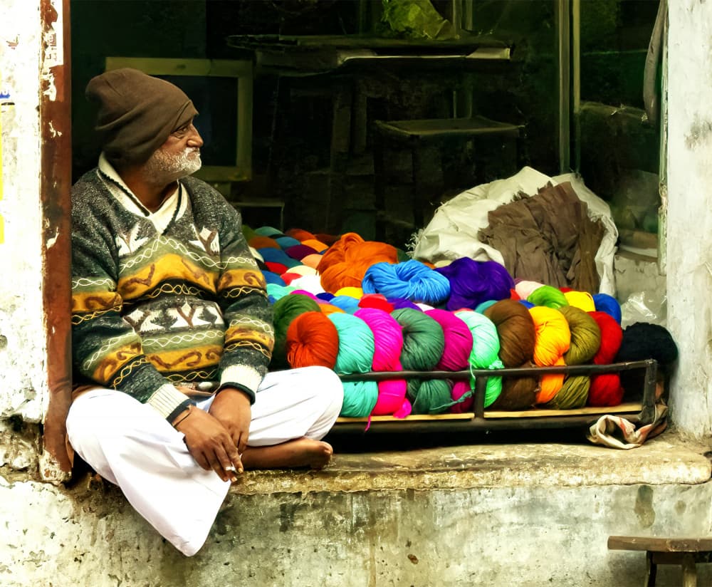 Indian Yarn Vendor by Ugur Erkmen — canvas wall art