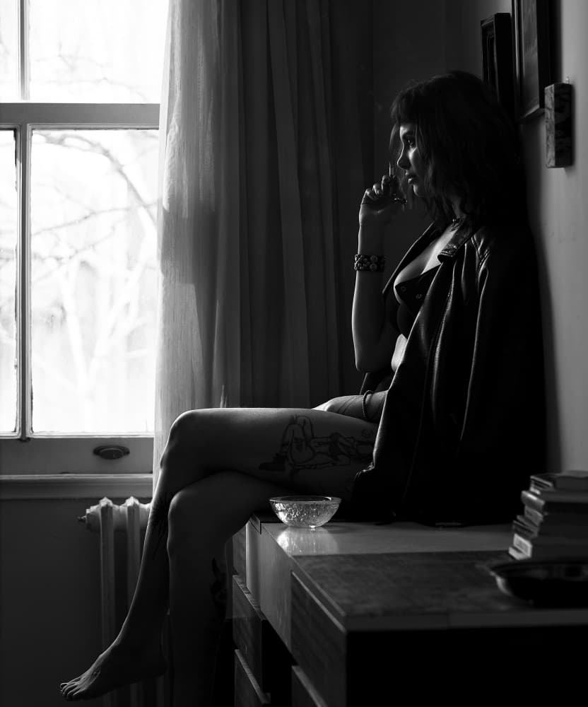 Pensive Woman By Window by Enis Onur — canvas wall art