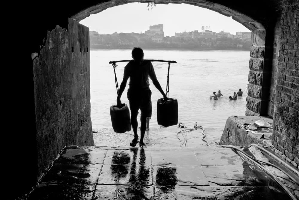 River Water Carrier Silhouette by Corinne Spector — canvas wall art