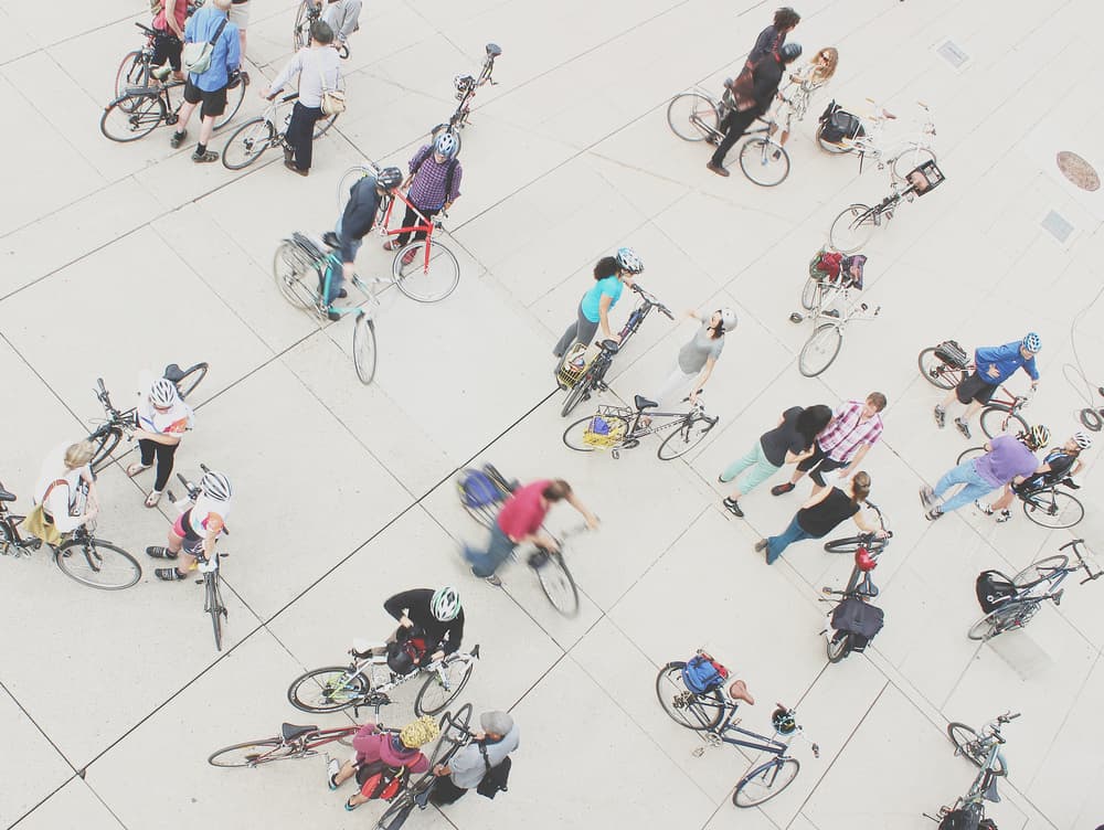 Urban Cyclists Overhead by Jian Wang — canvas wall art