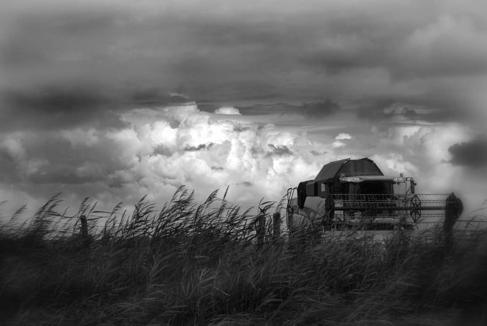 Harvester Under Storm Clouds by Yvette Depaepe — canvas wall art